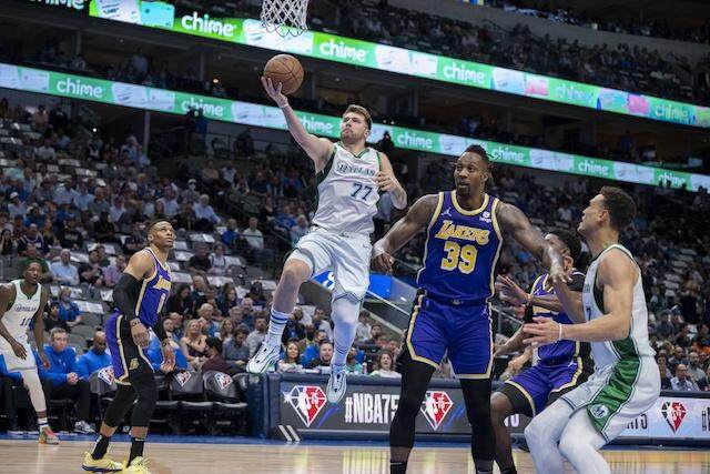 1648645416227000314.jpg Luka-Doncic-Dwight-Howard.jpg